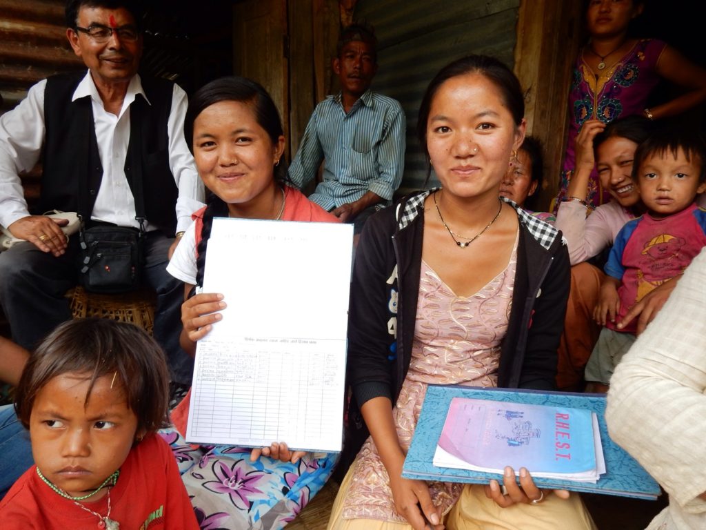 Saraswati and Parabati Thapa Magar leading a women’s savings and credit group meeting in the village of Chiri Kharka, Nepal.