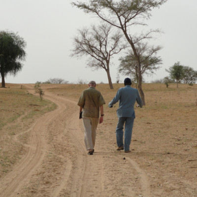 Peter Gubbels with community leader outside Koro, Mali.